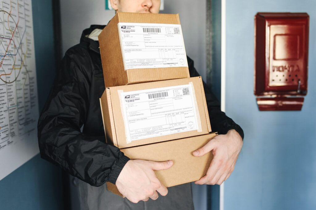 packages, delivery, delivery man-6153947.jpg